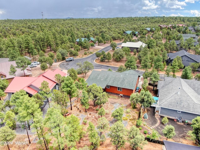 drone / aerial view with a view of trees