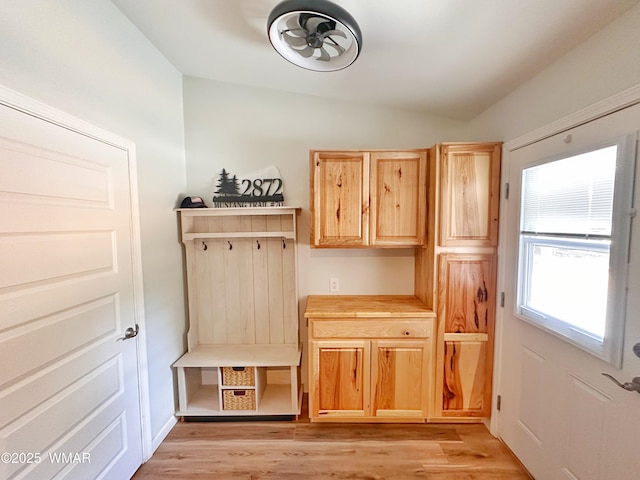 2872 Mustang Trl, Overgaard, AZ 85933 - mudroom featuring light wood-style flooring and vaulted ceiling