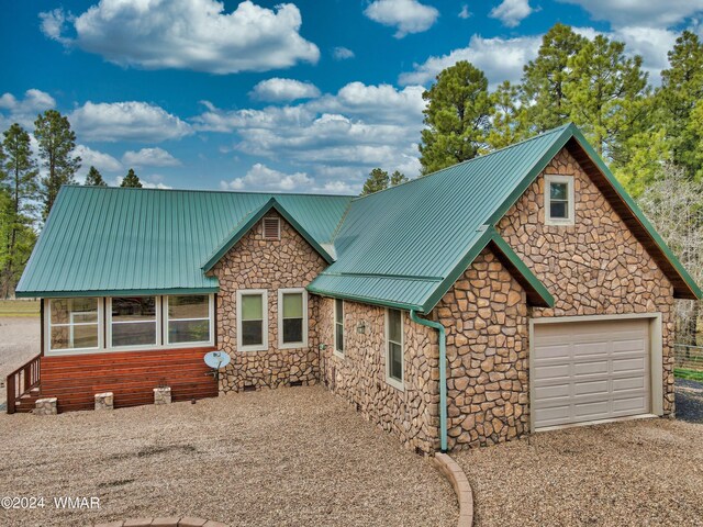 rustic home with crawl space and metal roof