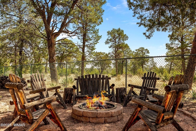 view of patio / terrace featuring an outdoor fire pit