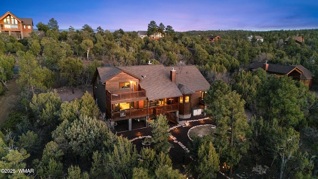 1610 S Canyon Ridge Trl, Show Low, AZ 85901 - aerial view of property and surrounding area with a forest