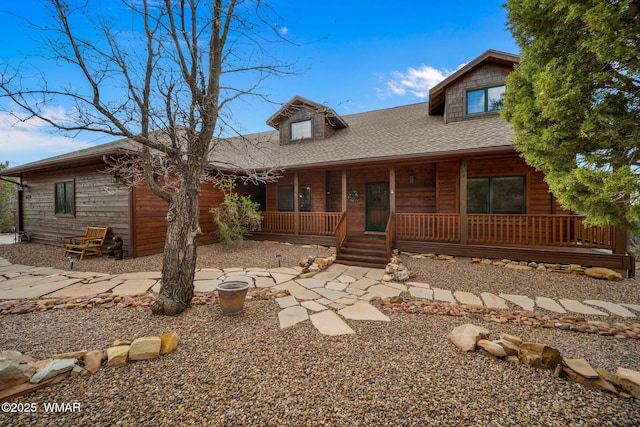 1610 S Canyon Ridge Trl, Show Low, AZ 85901 - chalet / cabin with a porch and a shingled roof
