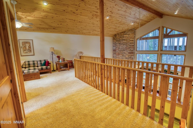 hall featuring high vaulted ceiling, beamed ceiling, wooden ceiling, carpet flooring, and recessed lighting