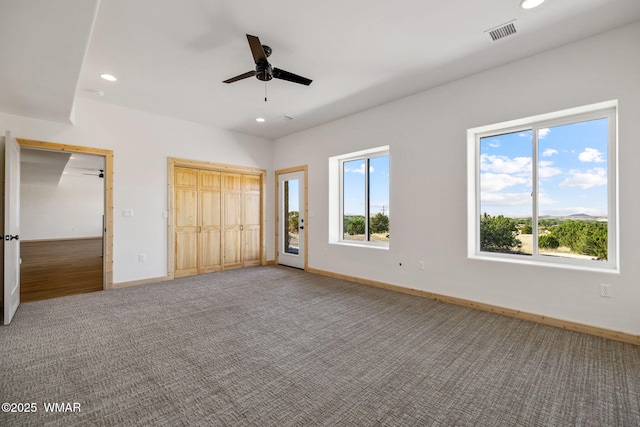 436 E 11th Ln, Eagar, AZ 85925 - unfurnished bedroom featuring carpet floors, recessed lighting, baseboards, and visible vents