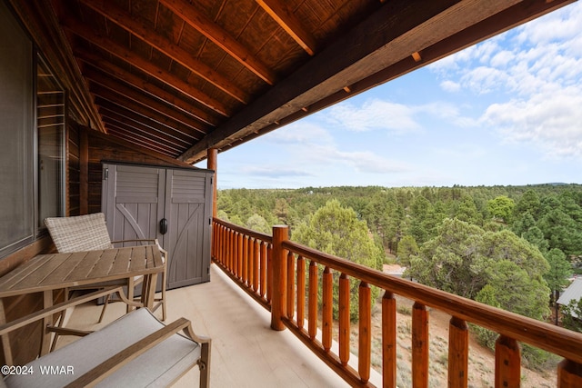 balcony with a forest view