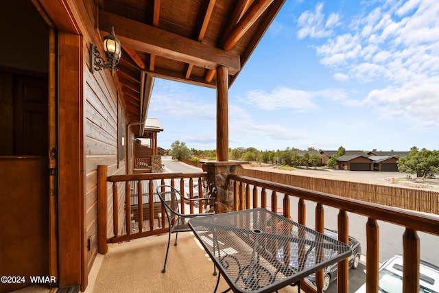 balcony with outdoor dining area