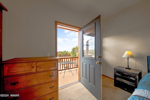 bedroom with light carpet