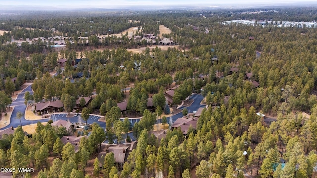 aerial view featuring a forest view