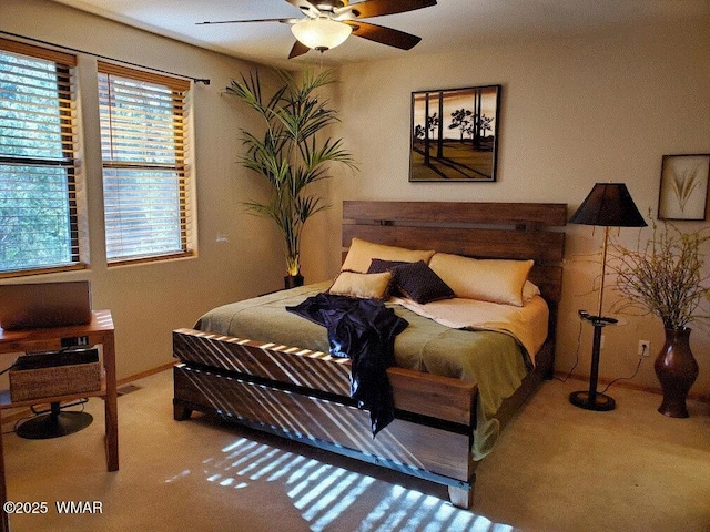 carpeted bedroom with baseboards