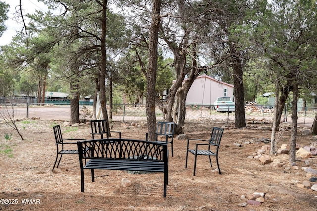 2853 Markham Rd, Overgaard, AZ 85933 - view of property's community with fence and an outdoor fire pit