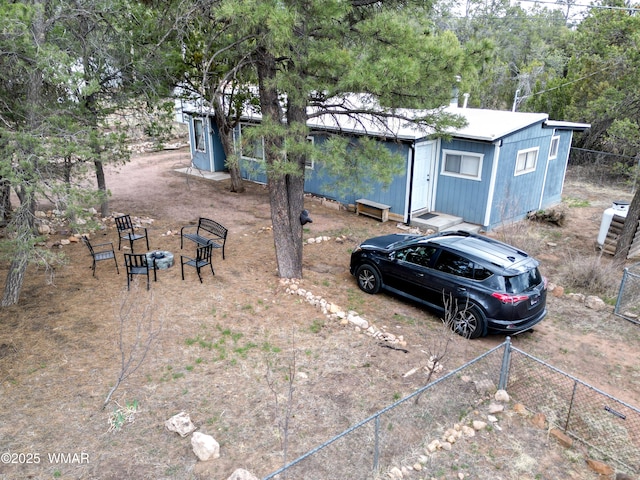 2853 Markham Rd, Overgaard, AZ 85933 - view of yard featuring fence and an outdoor fire pit