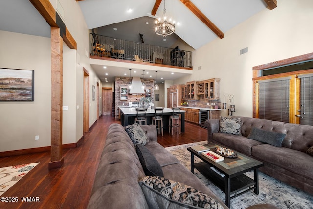 living room with visible vents, dark wood finished floors, wine cooler, beamed ceiling, and a notable chandelier