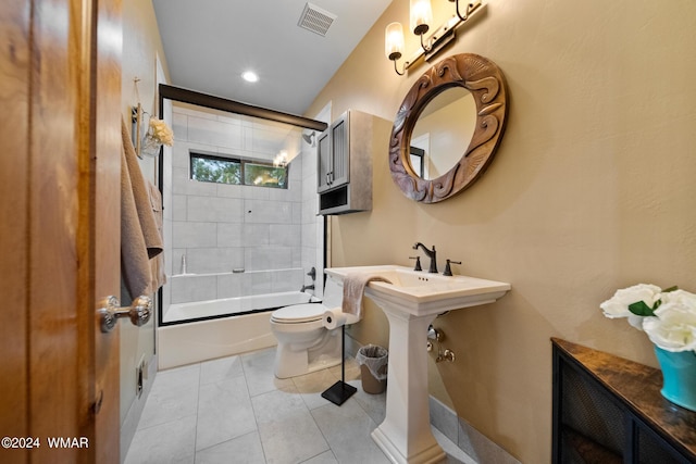 full bath featuring toilet, tile patterned flooring, visible vents, and bath / shower combo with glass door