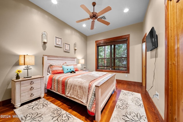 bedroom featuring recessed lighting, visible vents, ceiling fan, wood finished floors, and baseboards