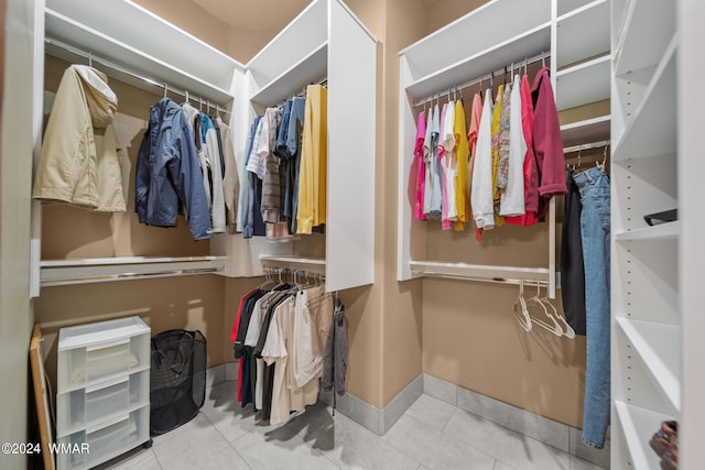 walk in closet featuring tile patterned floors