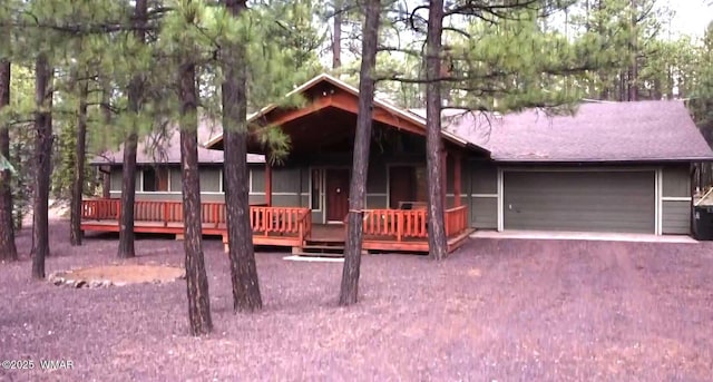 7287 Moon Creek Cir, Pinetop, AZ 85935 - view of front facade featuring an attached garage and driveway