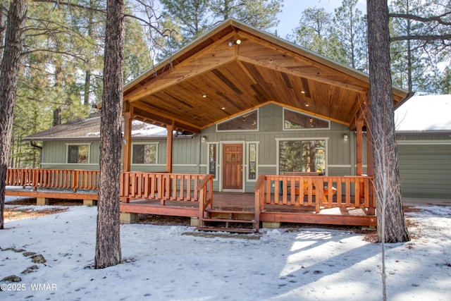 7287 Moon Creek Cir, Pinetop, AZ 85935 - chalet / cabin featuring a garage and a deck