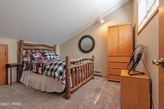 bedroom featuring a baseboard radiator, carpet, vaulted ceiling, and a textured ceiling