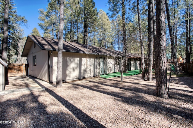 garage with fence