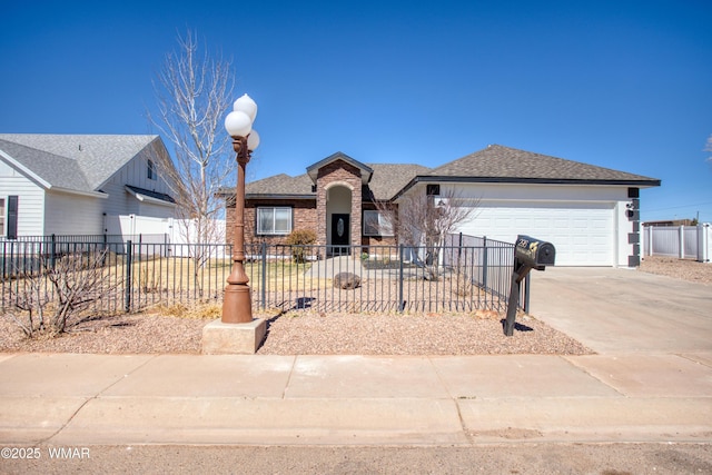 single story home featuring a garage, driveway, a shingled roof, and fence