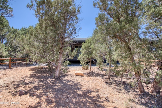 2071 N Bison Pass Ct, Show Low, AZ 85901 - view of yard with a deck and fence
