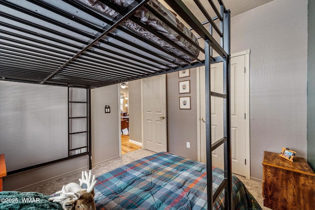 2385 Quarter Horse Trl, Overgaard, AZ 85933 - bedroom with carpet floors