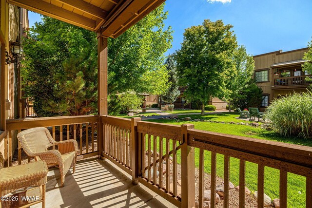2385 Quarter Horse Trl, Overgaard, AZ 85933 - wooden deck with a yard