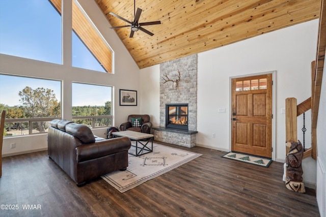 3457 Carefree Rd, Heber, AZ 85928 - living room featuring high vaulted ceiling, ceiling fan, a stone fireplace, wood finished floors, and wood ceiling