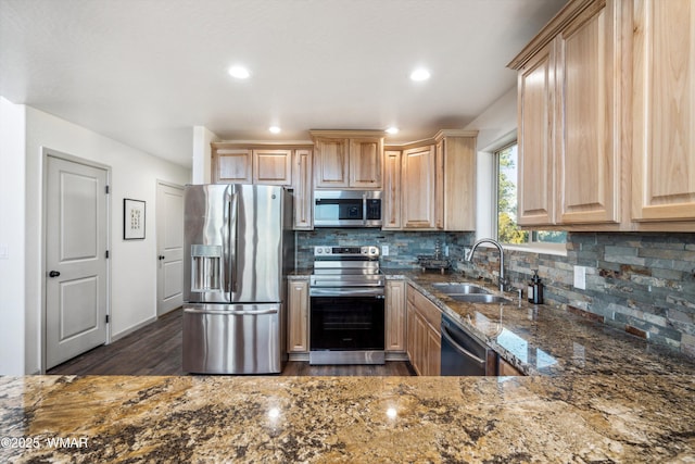 3457 Carefree Rd, Heber, AZ 85928 - kitchen with appliances with stainless steel finishes, light brown cabinets, dark wood finished floors, dark stone countertops, and recessed lighting