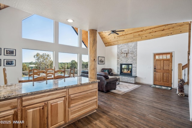 3457 Carefree Rd, Heber, AZ 85928 - kitchen with high vaulted ceiling, ceiling fan, plenty of natural light, light stone countertops, and recessed lighting