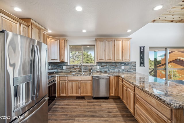 3457 Carefree Rd, Heber, AZ 85928 - kitchen with appliances with stainless steel finishes, a peninsula, dark wood-style floors, light brown cabinets, and recessed lighting