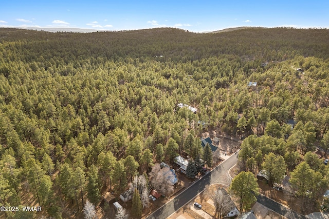 bird's eye view featuring a view of trees