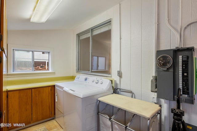 washroom featuring washing machine and dryer and laundry area