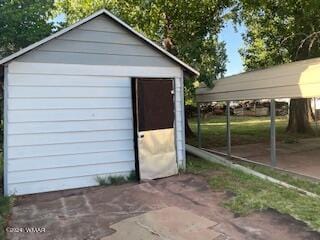 view of outbuilding with an outbuilding