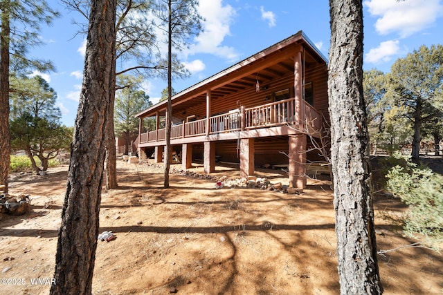 1601 N Stagecoach Cir, Show Low, AZ 85901 - back of property with log veneer siding and a wooden deck