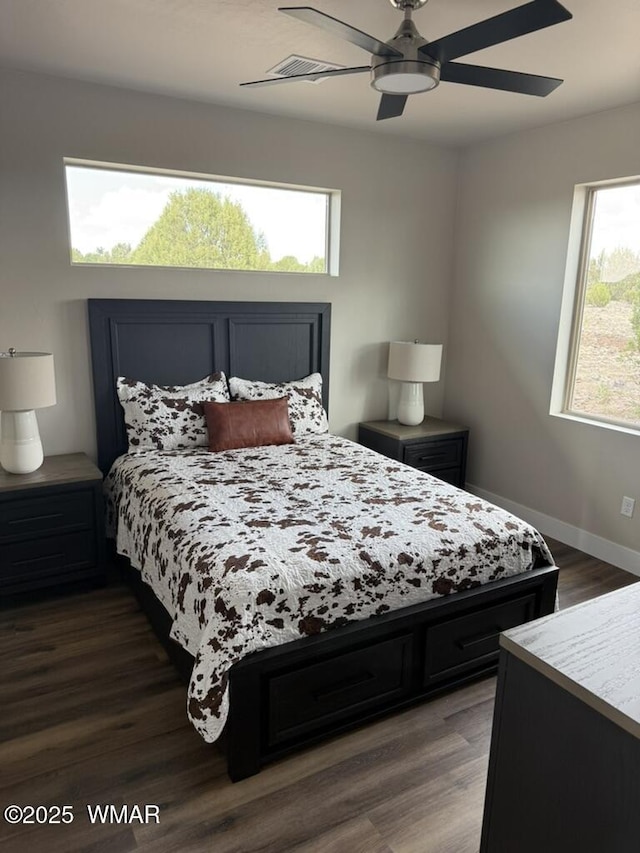 881 S Ridgeway Pl, Show Low, AZ 85901 - bedroom with dark wood-style flooring and ceiling fan