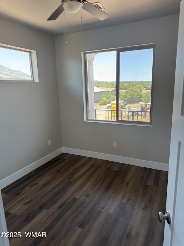 881 S Ridgeway Pl, Show Low, AZ 85901 - empty room with dark wood-style floors and ceiling fan