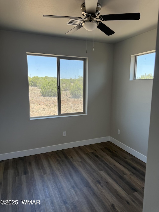 881 S Ridgeway Pl, Show Low, AZ 85901 - unfurnished room with dark wood-style floors and ceiling fan