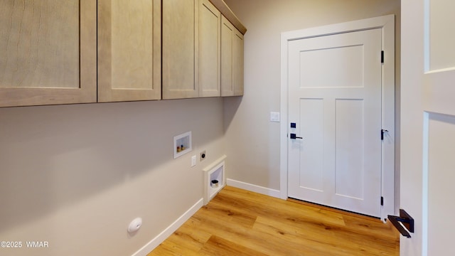 washroom featuring baseboards, hookup for an electric dryer, light wood-style flooring, cabinet space, and washer hookup