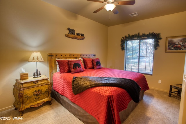 bedroom featuring visible vents, baseboards, carpet, and ceiling fan