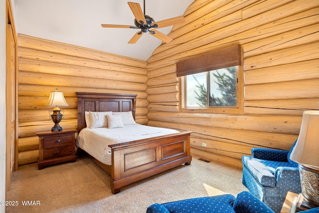 bedroom with visible vents, rustic walls, vaulted ceiling, and light carpet