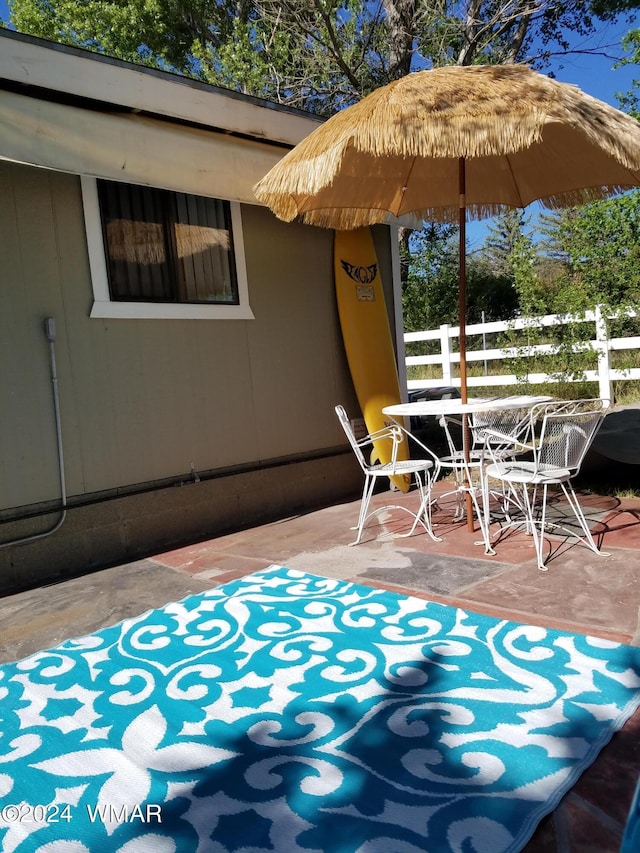 view of patio / terrace with fence