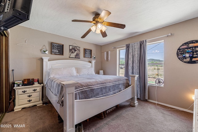 389 E 3rd St, Eagar, AZ 85925 - carpeted bedroom featuring ceiling fan and a textured ceiling