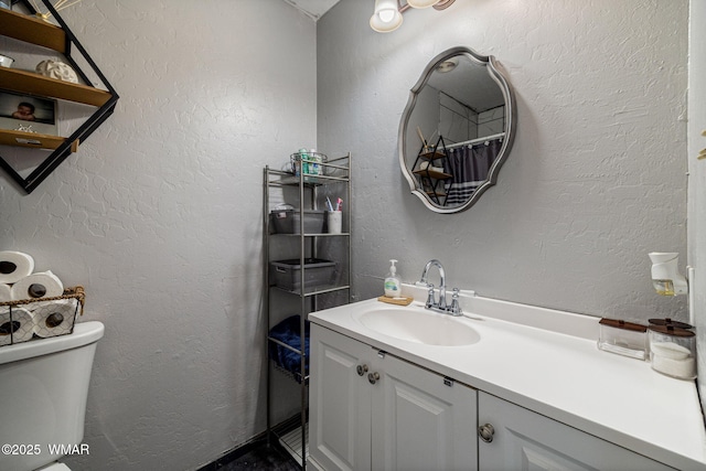389 E 3rd St, Eagar, AZ 85925 - bathroom featuring toilet and vanity
