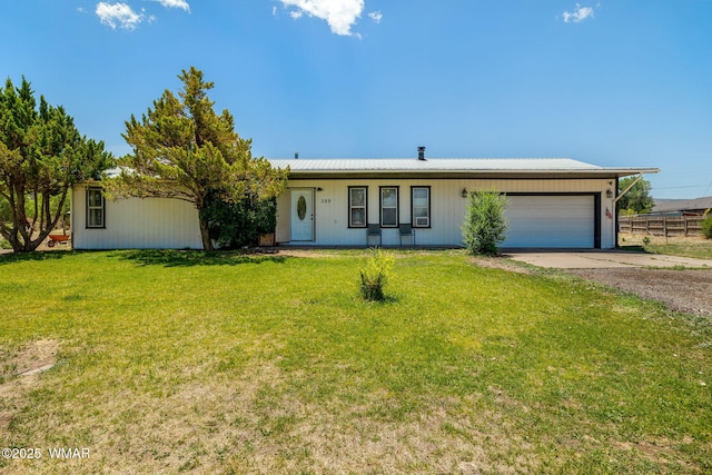 389 E 3rd St, Eagar, AZ 85925 - ranch-style home with driveway, an attached garage, and a metal roof