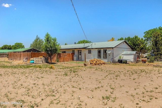 389 E 3rd St, Eagar, AZ 85925 - rear view of property with roof mounted solar panels