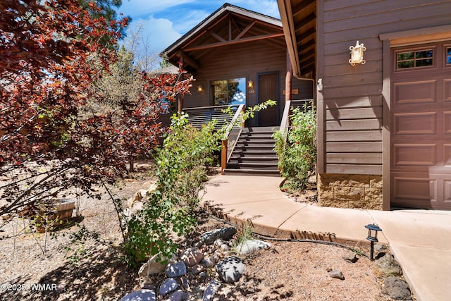 420 N Retreat Way, Show Low, AZ 85901 - doorway to property featuring an attached garage