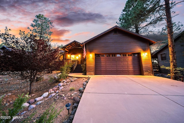 420 N Retreat Way, Show Low, AZ 85901 - rustic home featuring concrete driveway, a garage, and stairway