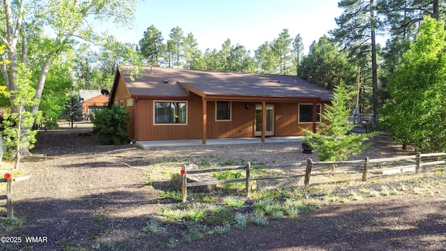 677 Fox Ln, Lakeside, AZ 85929 - view of front facade with a patio and a shingled roof