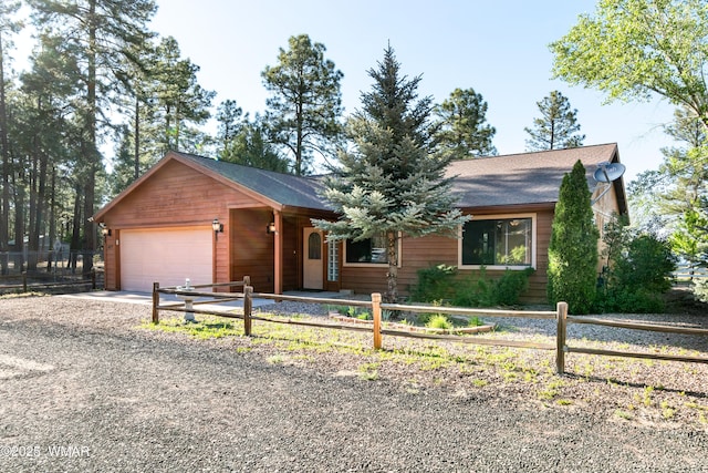 677 Fox Ln, Lakeside, AZ 85929 - view of front facade featuring an attached garage, driveway, and a shingled roof
